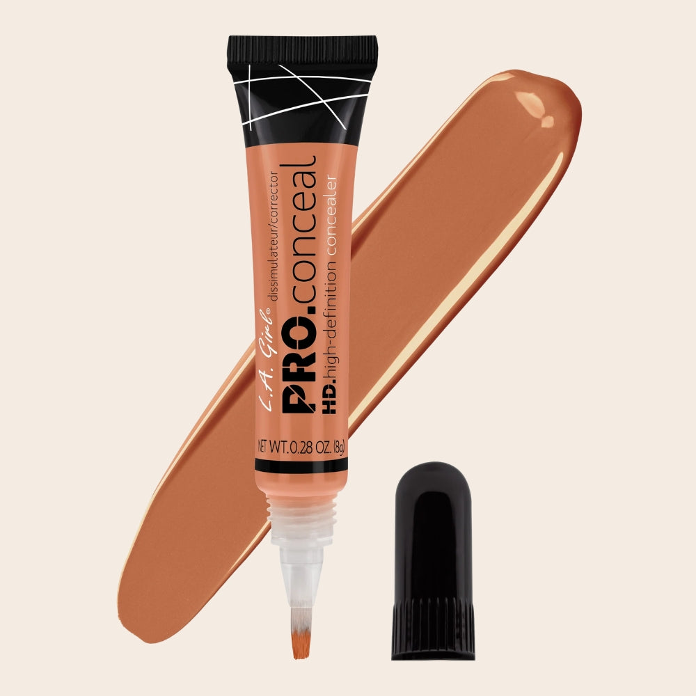 L.A. Girl HD Pro Conceal Apricot Corrector, 8 g tube with brush-tip applicator, black cap and matching apricot swatch.