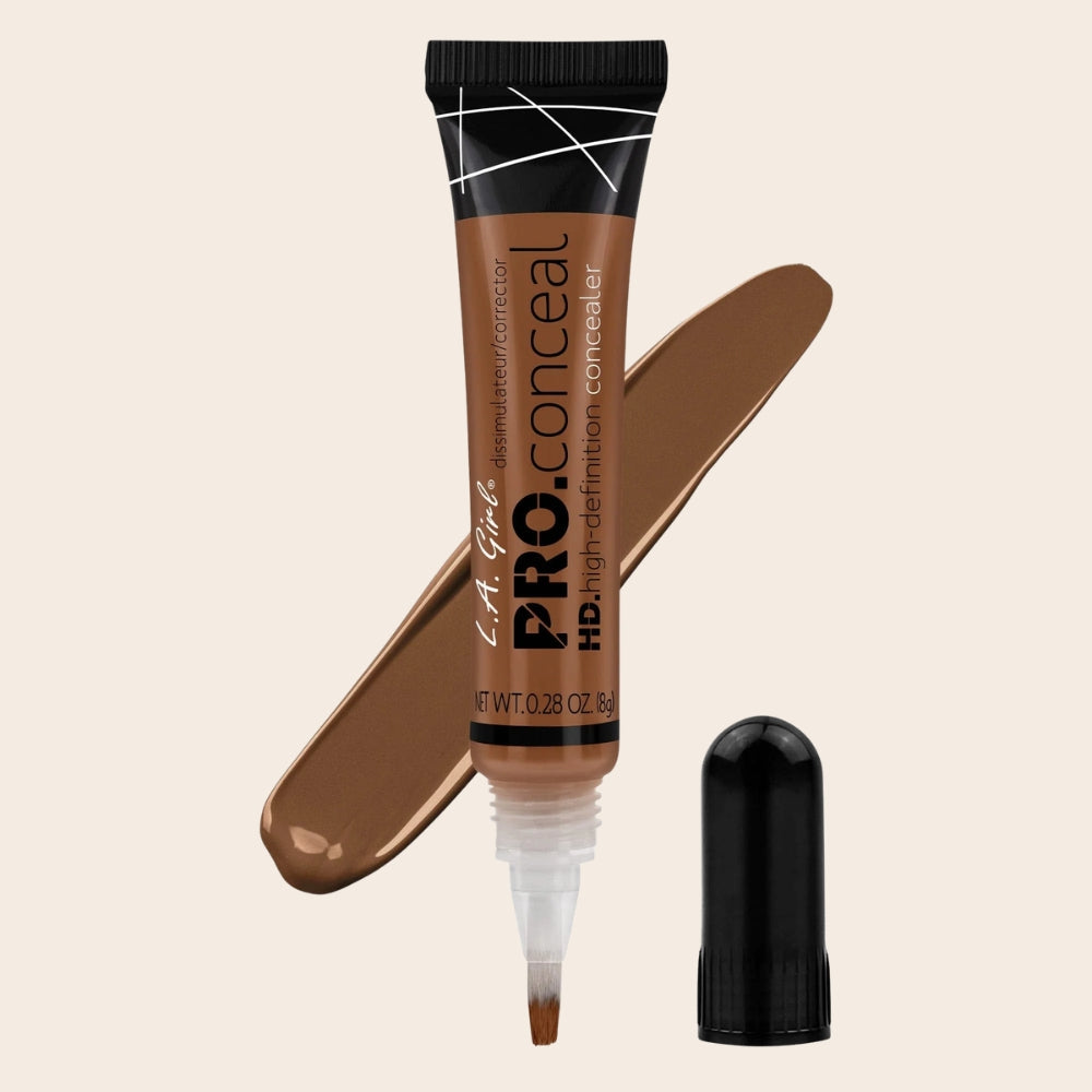 L.A. Girl HD Pro Conceal concealer in Toast, 8 g tube with brush-tip applicator, black cap and matching deep brown swatch.