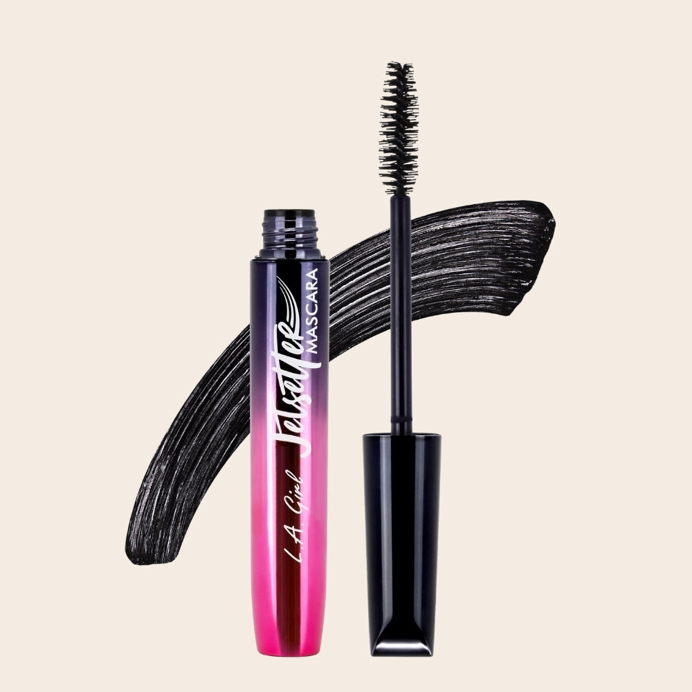 L.A. Girl Jetsetter Mascara in Black, shown open with mascara wand and a black product swatch behind the tube.
