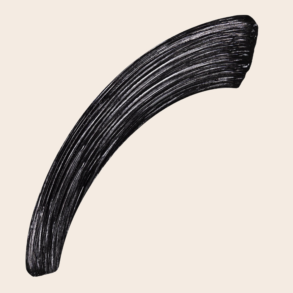 Black swatch of L.A. Girl Jetsetter Mascara showing the deep black colour and brushed mascara texture.