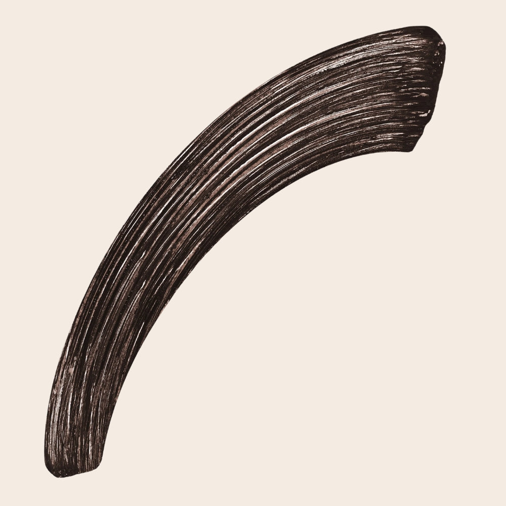 Dark brown swatch of L.A. Girl Jetsetter Mascara showing the brown-black colour and brushed mascara texture.